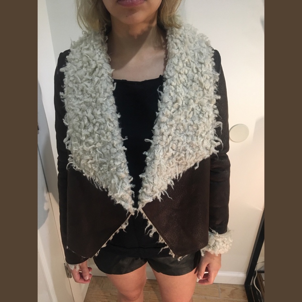 Leather jacket lined with faux fur on the inside